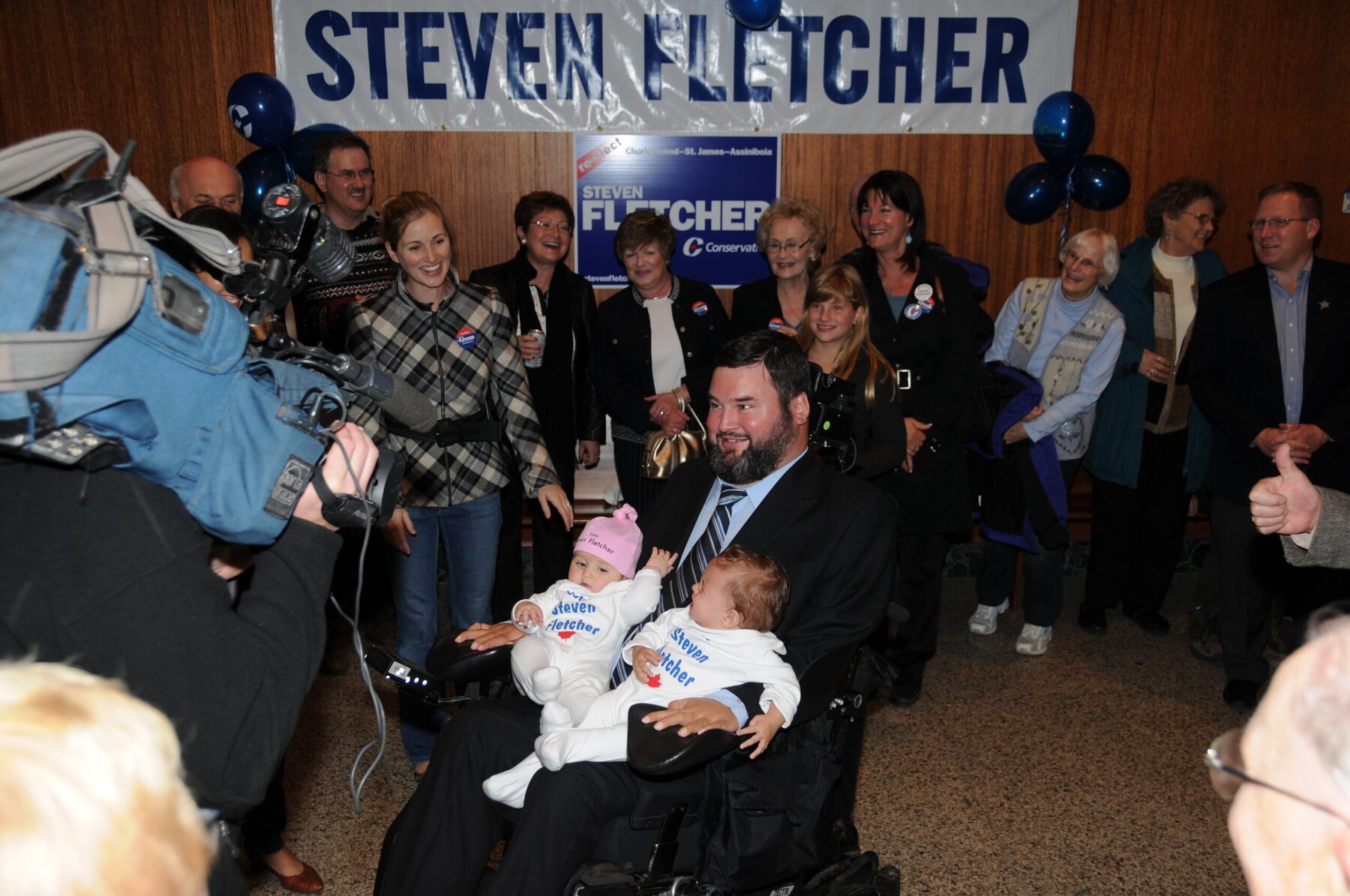 Steven Fletcher with supporters at a community gathering