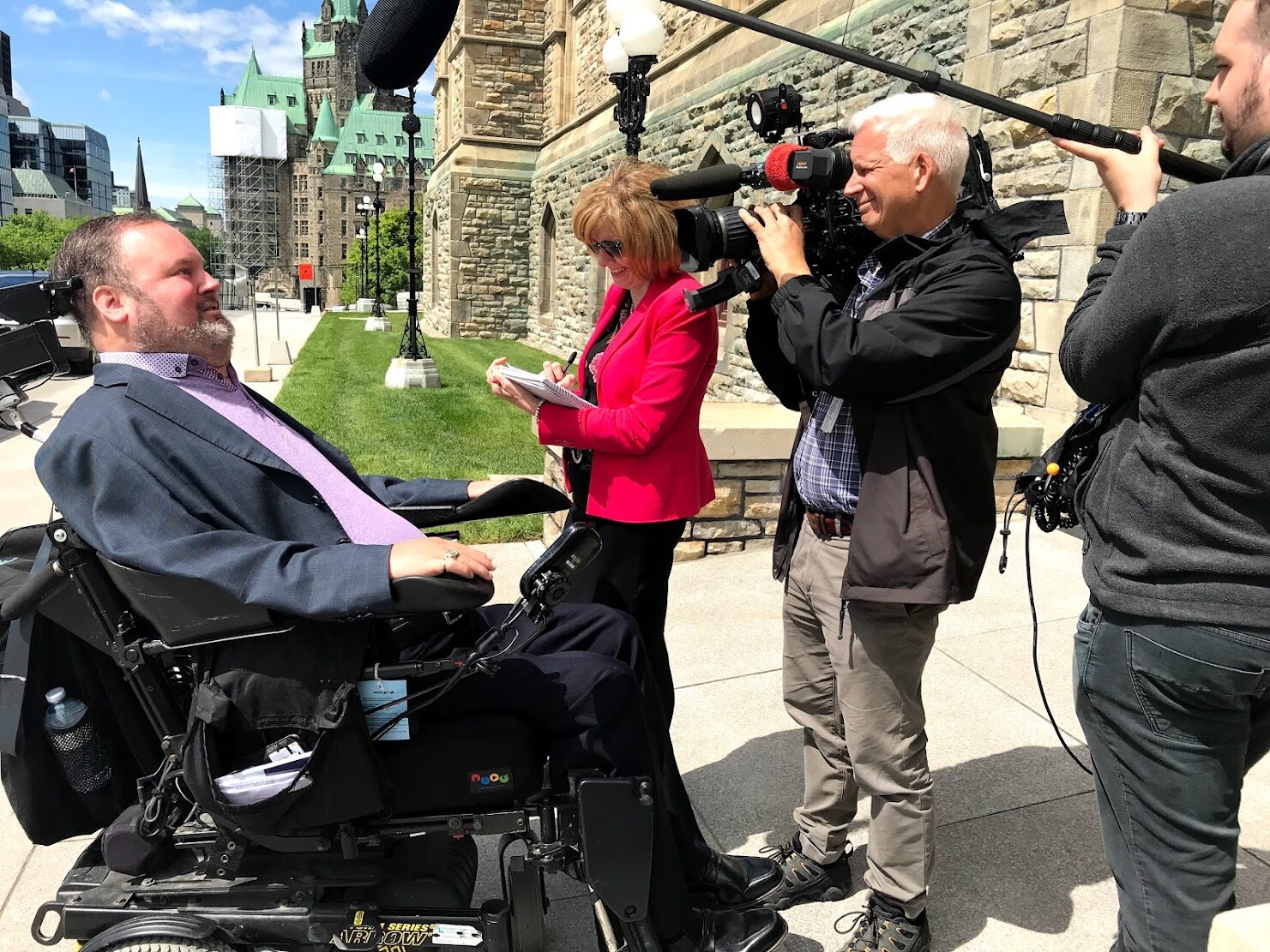 Steven Fletcher being interviewed outside Parliament