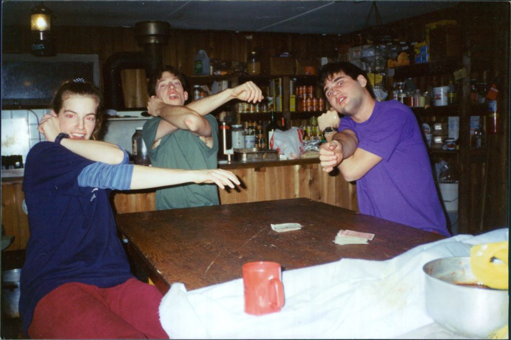 Winter game of spoons at Mantario Cabin after long ski trip.